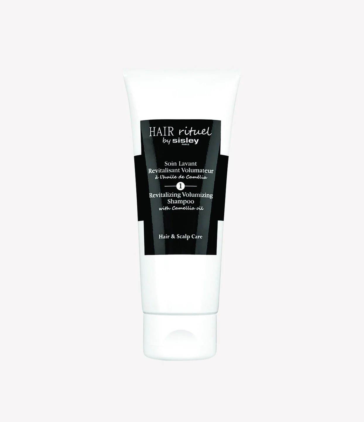 SISLEY Revitalizing Volumizing Shampoo with Camellia Oil 200ml  سيسلي شامبو مُنشِّط ومُكثِّف للشعر بزيت الكاميليا