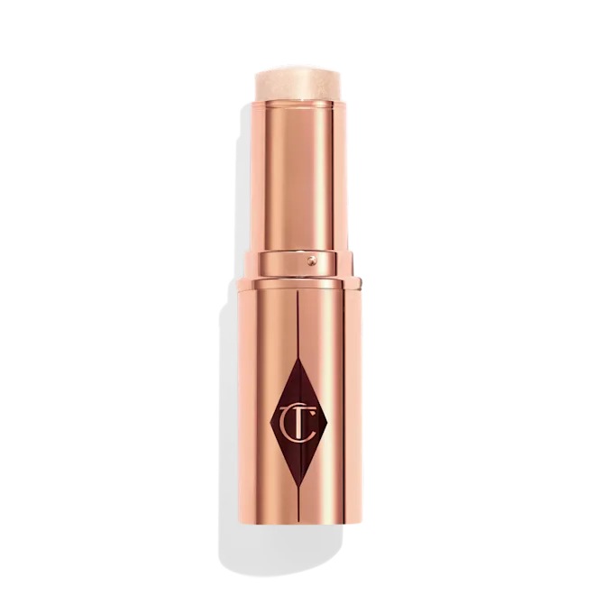 CHARLOTTE TILBURY Unreal Highlighter Glow Stick شارلوت قلم هايلايتر يمنح البشرة إشراقة طبيعية